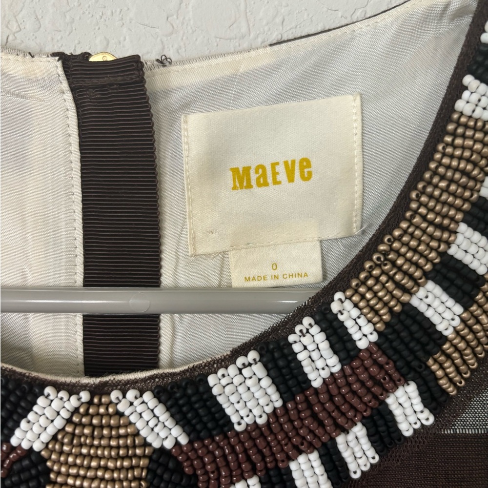 Anthropologie Maeve brand fit and flare dress with beautiful neckline beading.